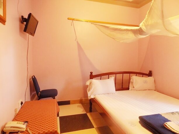 Imagen de la habitación del Hotel Rosama Guest House. Foto 18