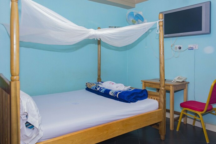 Imagen de la habitación del Hotel Rosama Guest House. Foto 19