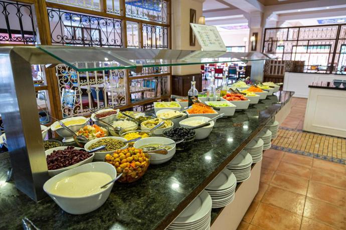 Imagen del bar/restaurante del Hotel Rose Aquapark Marrakech. Foto 2