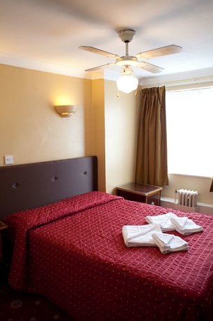 Imagen de la habitación del Hotel Rose Court. Foto 8