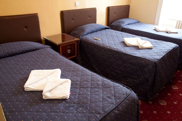 Imagen de la habitación del Hotel Rose Court. Foto 9