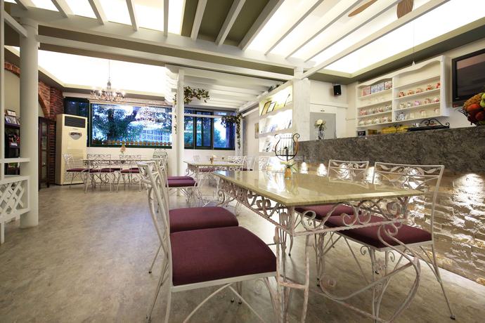 Imagen de los interiores del Hotel Rose Garden Bandb. Foto 14