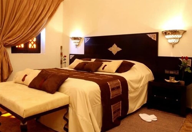 Imagen de la habitación del Hotel Rose Garden Resort and Spa. Foto 7