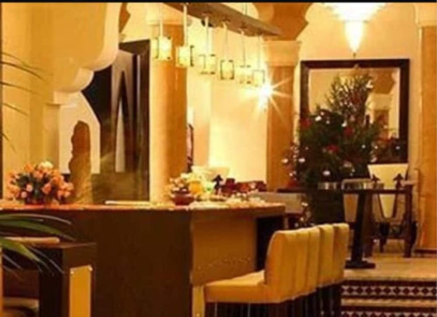 Imagen del bar/restaurante del Hotel Rose Garden Resort and Spa. Foto 4