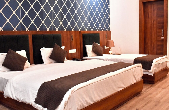 Imagen de la habitación del Hotel Rose Inn Haridwar. Foto 2