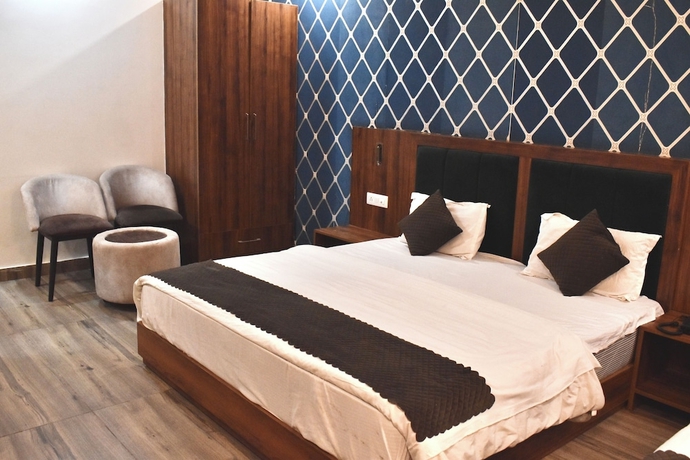 Imagen de la habitación del Hotel Rose Inn Haridwar. Foto 3