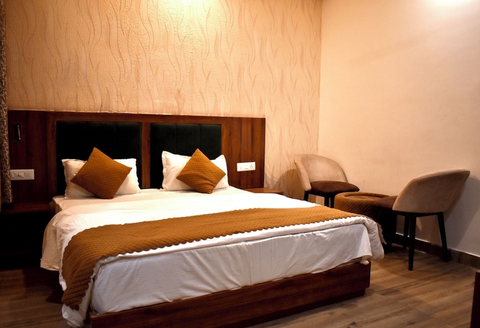 Imagen de la habitación del Hotel Rose Inn Haridwar. Foto 4