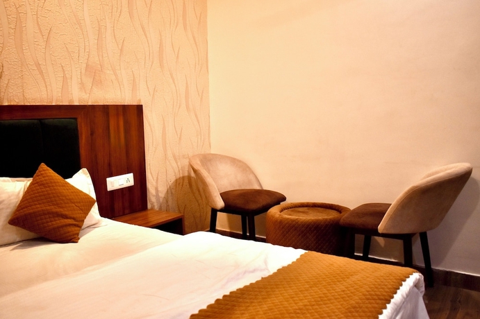 Imagen de la habitación del Hotel Rose Inn Haridwar. Foto 7