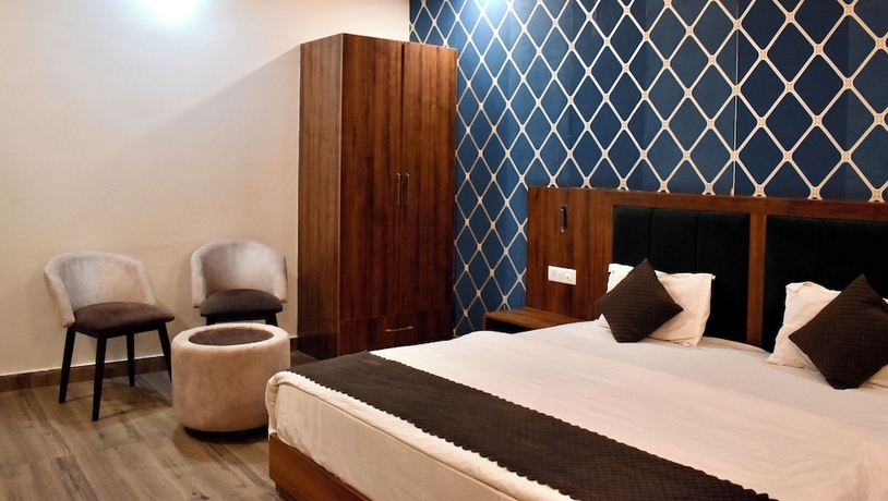 Imagen de la habitación del Hotel Rose Inn Haridwar. Foto 8