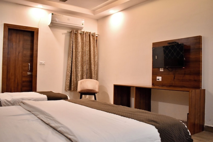 Imagen de la habitación del Hotel Rose Inn Haridwar. Foto 10