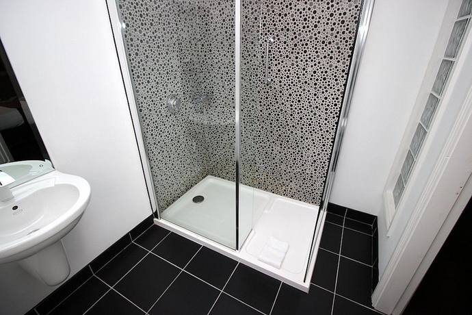 Imagen de la habitación del Hotel Rose Lodge Guest House. Foto 7
