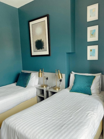 Imagen de la habitación del Hotel Rose Lodge Guest House. Foto 11