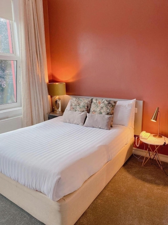 Imagen de la habitación del Hotel Rose Lodge Guest House. Foto 13
