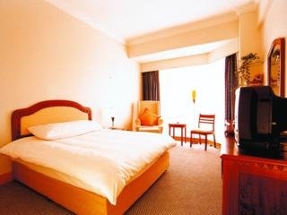 Imagen de la habitación del Hotel Rose, SHENYANG. Foto 2