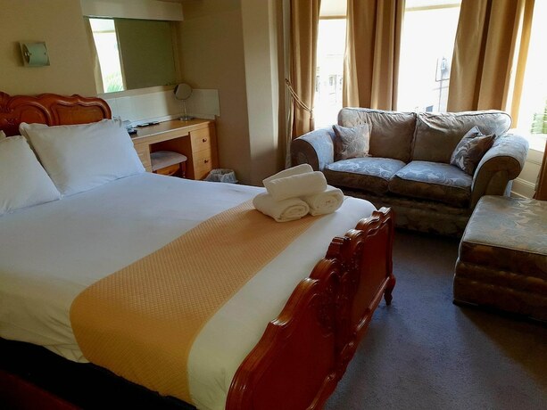 Imagen de la habitación del Hotel Rose Tor. Foto 15