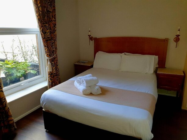 Imagen de la habitación del Hotel Rose Tor. Foto 16