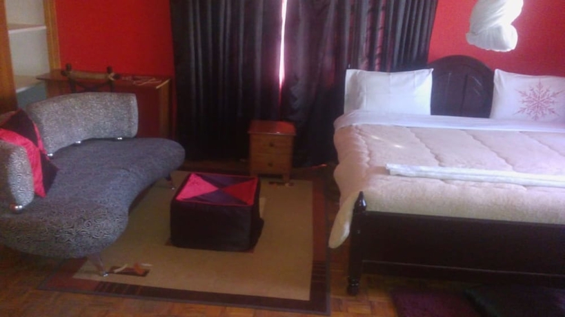 Imagen de la habitación del Hotel Rose Wood Lounge. Foto 4
