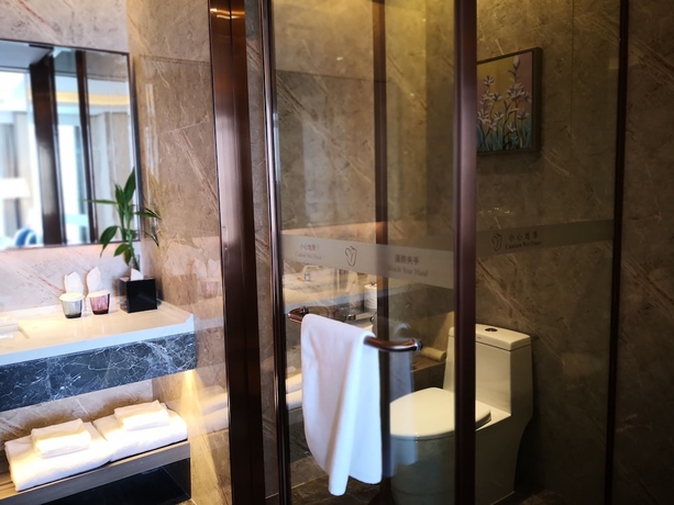 Imagen de la habitación del Hotel Rosedale Taicang. Foto 17