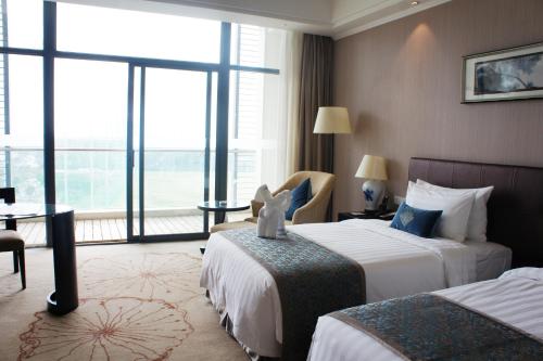 Imagen de la habitación del Hotel Rosedale & Resorts Suzhou. Foto 5