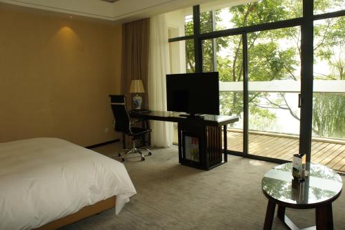 Imagen de la habitación del Hotel Rosedale & Resorts Suzhou. Foto 8