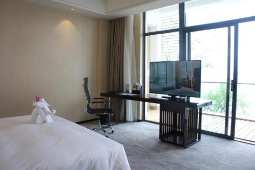 Imagen de la habitación del Hotel Rosedale & Resorts Suzhou. Foto 9