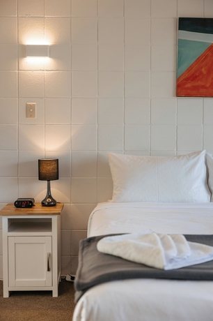Imagen de la habitación del Hotel Roselands Motel. Foto 4