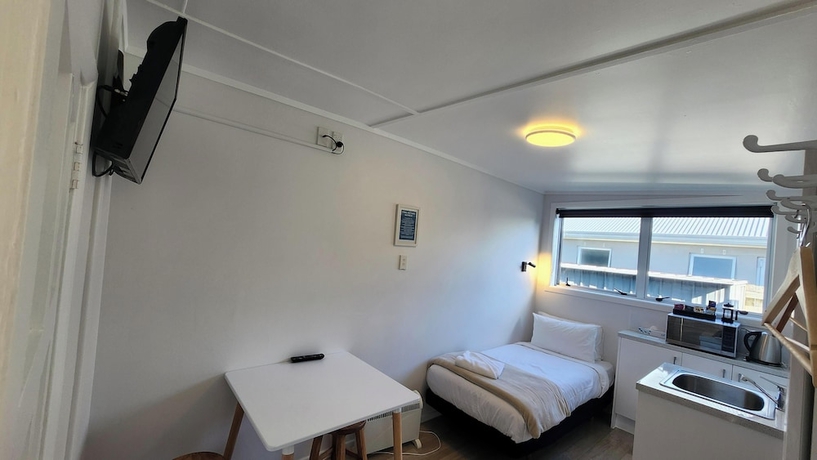 Imagen de la habitación del Hotel Roselands Motel. Foto 11