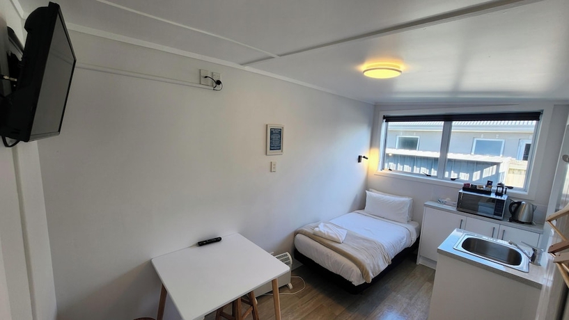 Imagen de la habitación del Hotel Roselands Motel. Foto 12