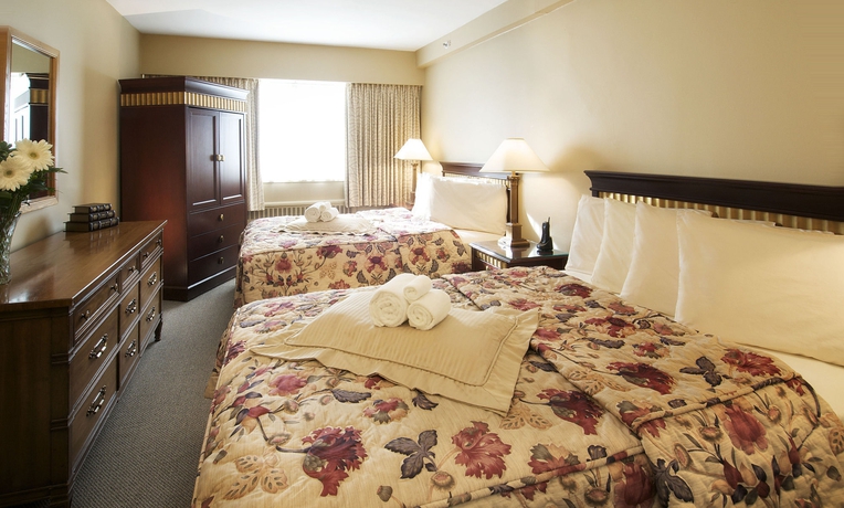 Imagen de la habitación del Hotel Rosellen Suites At Stanley Park. Foto 1