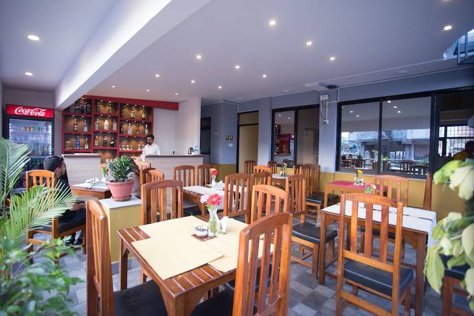 Imagen del bar/restaurante del Hotel Rosemary Homes. Foto 2