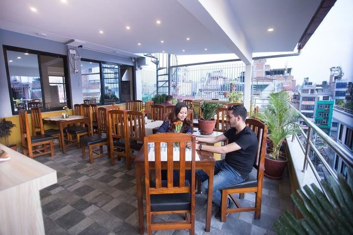 Imagen del bar/restaurante del Hotel Rosemary Homes. Foto 3