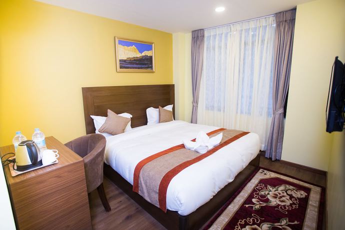 Imagen de la habitación del Hotel Rosemary Homes. Foto 7