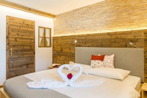 Imagen de la habitación del Hotel Rosengarten, Dobbiaco. Foto 3