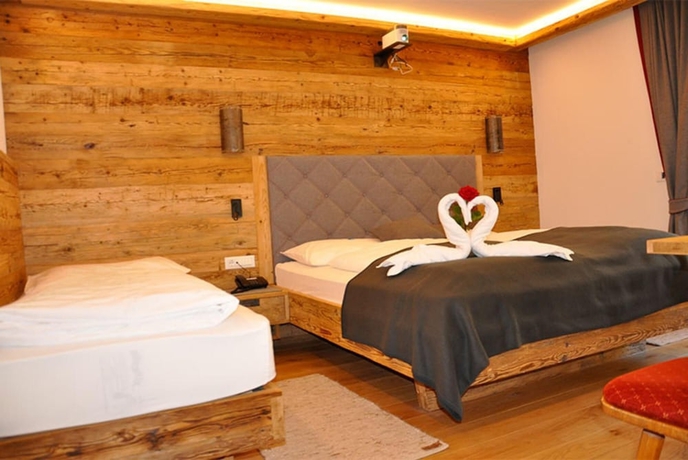Imagen de la habitación del Hotel Rosengarten, Dobbiaco. Foto 18
