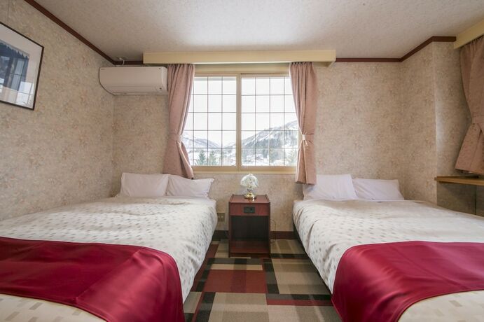 Imagen de la habitación del Hotel Rosenheim Hakuba. Foto 18