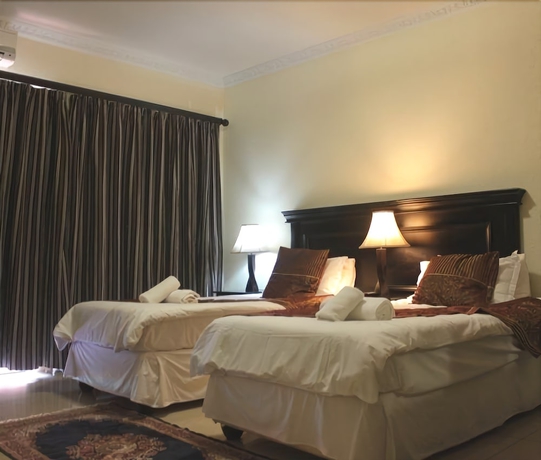Imagen de la habitación del Hotel Rosenthal Guesthouse. Foto 9