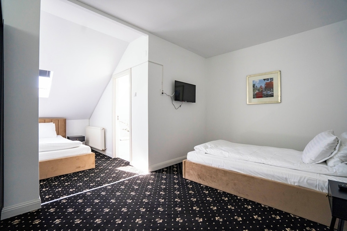 Imagen de la habitación del Hotel Rosetti Inn. Foto 2