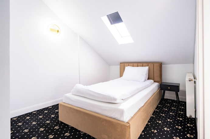 Imagen de la habitación del Hotel Rosetti Inn. Foto 3