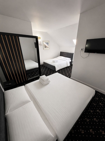 Imagen de la habitación del Hotel Rosetti Inn. Foto 4