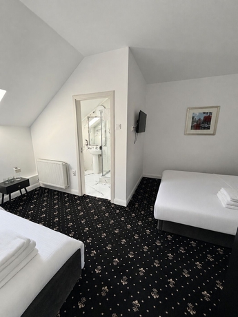 Imagen de la habitación del Hotel Rosetti Inn. Foto 5