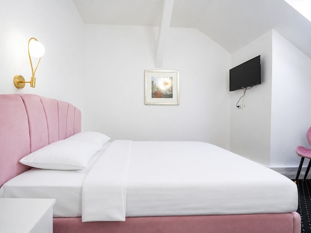 Imagen de la habitación del Hotel Rosetti Inn. Foto 6