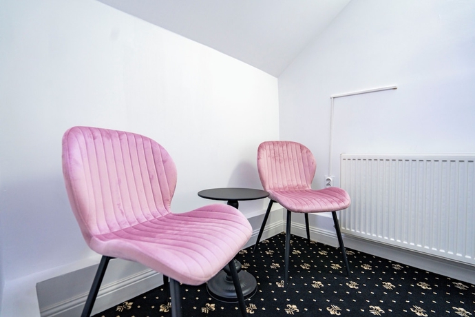 Imagen de la habitación del Hotel Rosetti Inn. Foto 10