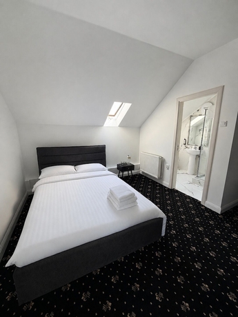 Imagen de la habitación del Hotel Rosetti Inn. Foto 13