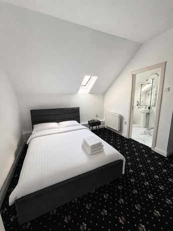 Imagen de la habitación del Hotel Rosetti Inn. Foto 14