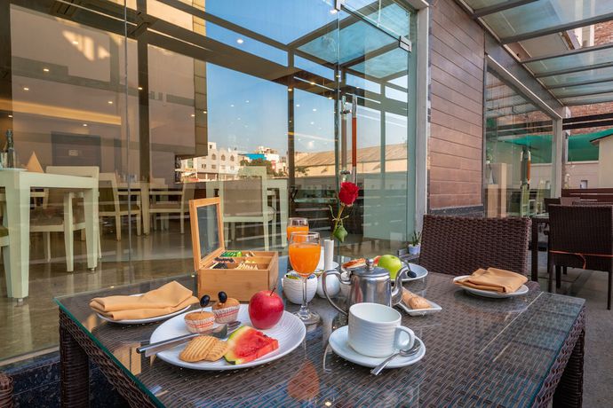 Imagen del bar/restaurante del Hotel Rosewood Apartment - Gurgaon. Foto 5