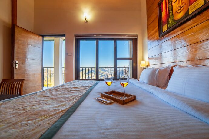 Imagen de la habitación del Hotel Rosewood Dhanachuli Retreat. Foto 19