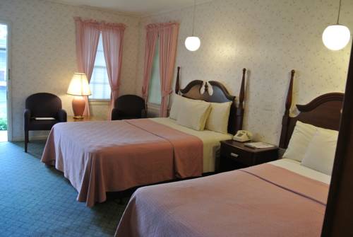 Imagen de la habitación del Hotel Rosewood Inn. Foto 1