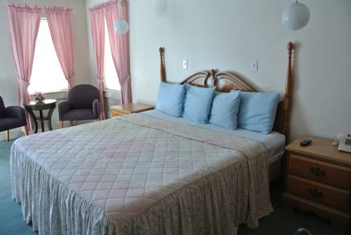 Imagen de la habitación del Hotel Rosewood Inn. Foto 5