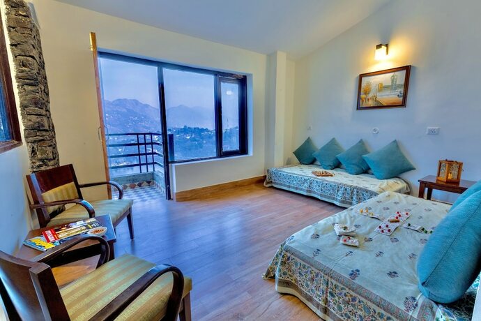 Imagen de la habitación del Hotel Rosewood Retreat Bhimtal. Foto 19