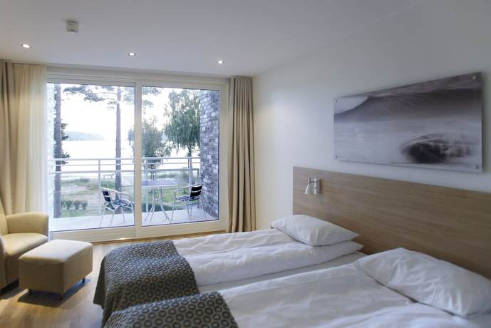 Imagen de la habitación del Hotel Rosfjord Strandhotell. Foto 19